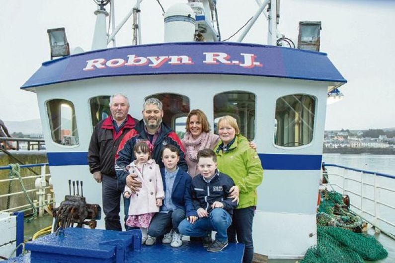 Skipper celebrating clean bill of health with trawler Robyn Image