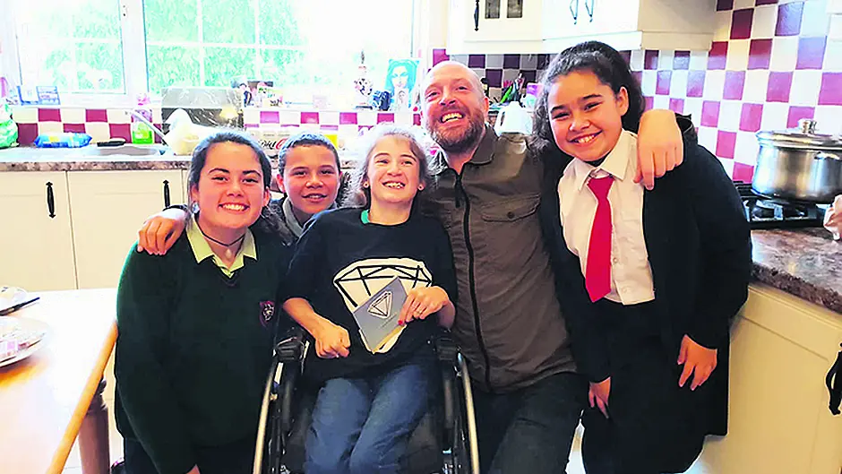 Singer Brian's good deed-y for his number one fan Jennifer Image