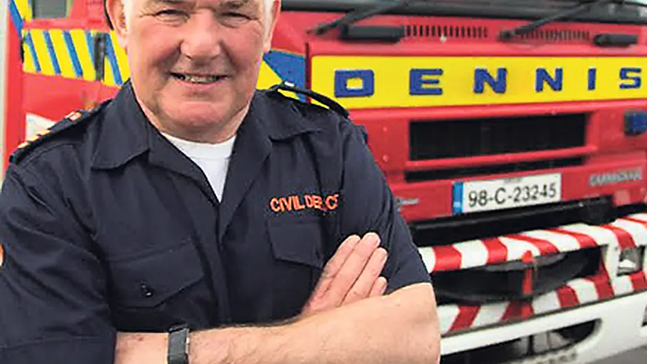 John is honoured for his 43 years with Civil Defence Image