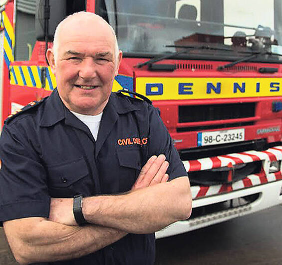 John is honoured for his 43 years with Civil Defence Image