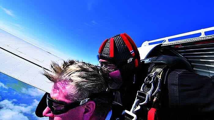 Mayor reaches new heights in parachute jump Image