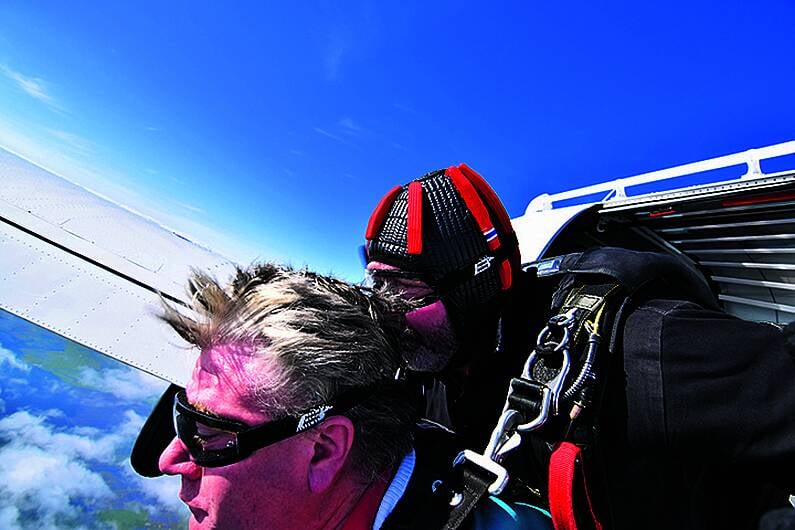 Mayor reaches new heights in parachute jump Image