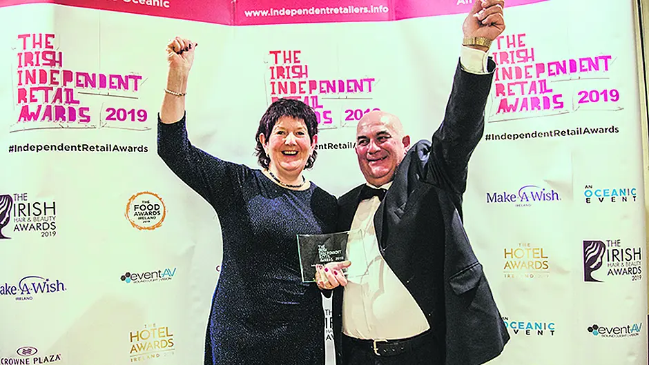 Family furniture firm's double win Image