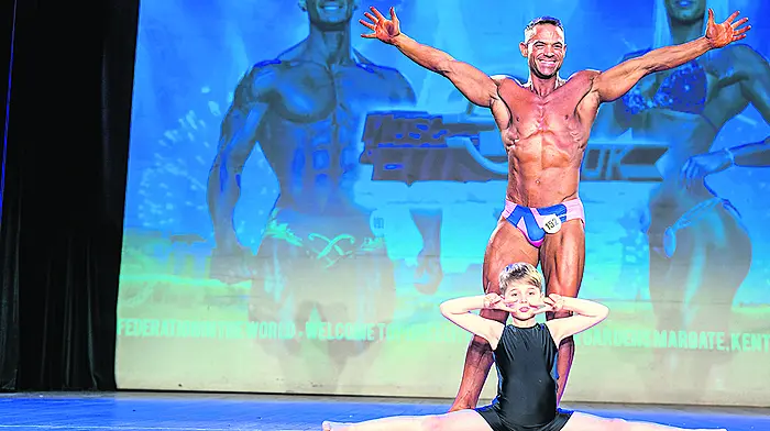 Evan helps his dad to two world titles Image