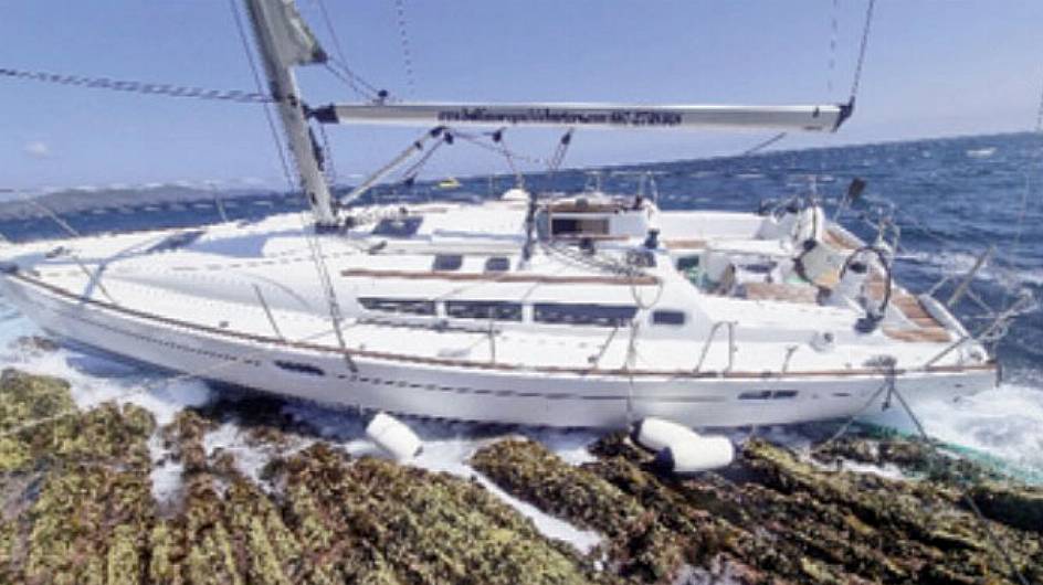 Yacht was smashed on rocks after net stuck in propeller Image