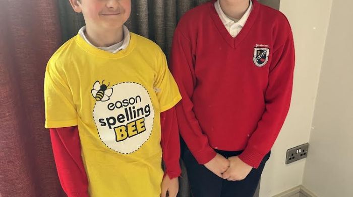 Eoin Rutherford Miles beside his classmate Teja Roche from Gaelscoil Bheanntraí at the Clayton Hotel in Cork where Eoin competed in the Eason Spelling Bee final.