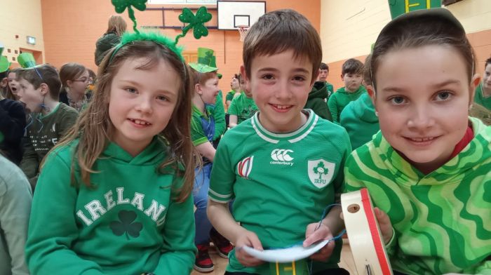 Pupils of Carrigboy National School Tiah Carroll O’Driscoll, Stephen O’Keefe and Sadie Ward enjoying the recent school’s Seachtain na Gaeilge concert.
