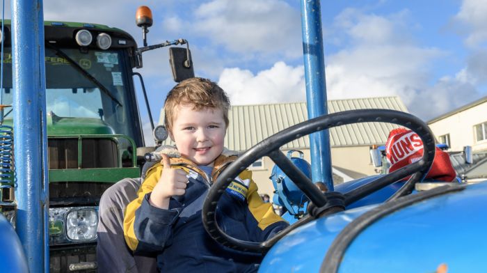 Adam Holland from Newcestown enjoying his day in the sunshine at the recent Ahiohill tractor run. (Photo: David Patterson)