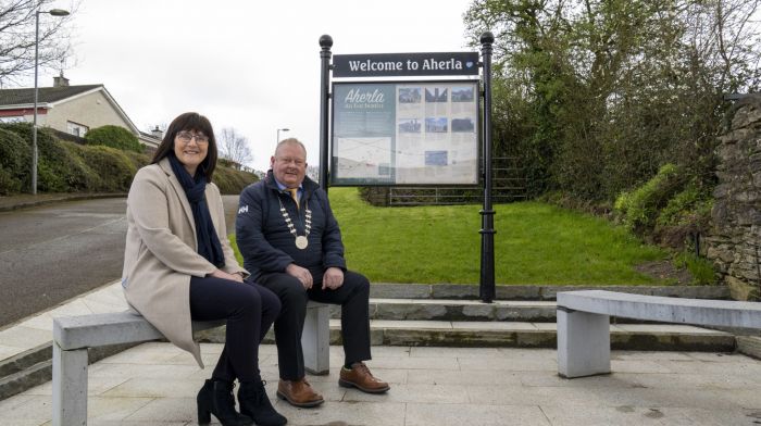 Anne Bruen, Aherla Active Community Group and Cathaoirleach of Macroom Municipal District, Cllr Ted Lucey admiring some of the enhancements made to Aherla village under the Cork County Council funded 2022 Village Enhancement Scheme.  Some of the main enhancements include a new paved focal point for the village which includes a bicycle stand, seating, new display board and a structure to accommodate the new Christmas tree which will be showcased during the festive period.  New speed detector signage and town signs were also added as part of the funding.   (Photo: Brian Lougheed)