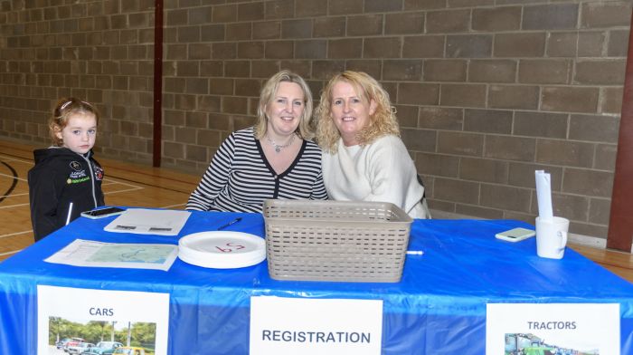 Aoife and Ruth McSweeney (Ballinacarriga) and Mairead Duggan (Dunmanway) had a busy day registering participants at the Ballinacarriga tractor, truck and car run which was held recently in aid of Cancer Connect, Ballinacarriga National School and Randal Óg GAA.   (Photo: David Patterson)