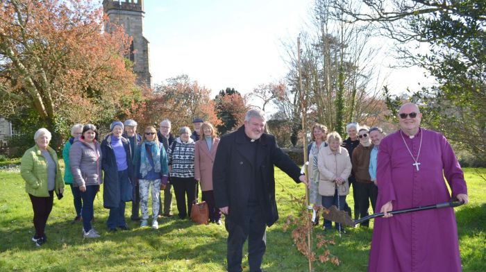 Bishop Paul Colton planting an oak tree at St. Barrahanes Church in Castletownshend on Good Friday to mark his Silver Jubilee as Bishop of Cork, Cloyne and Ross included in the photo are Rev. John Ardis, Rev. Carol Pound and local parishioners.  Photo; Anne Minihane.