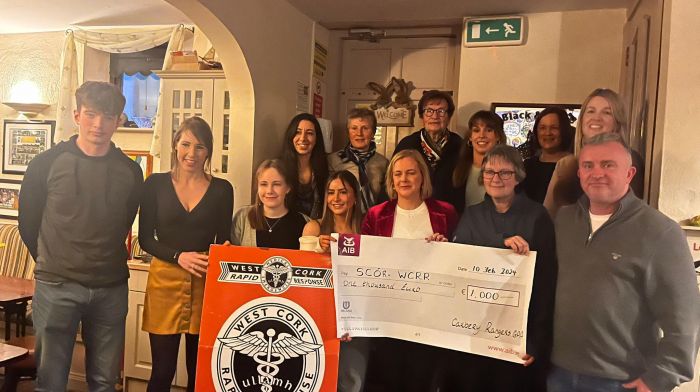 The Carbery Rangers RossSync winners presenting their cheque of €1,000 to their chosen charity, West Cork Rapid Response.