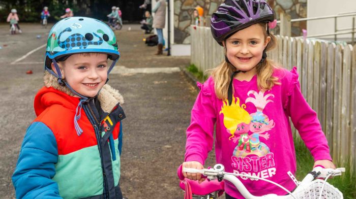 Fionn Conroy (5) from Dunmanway and Aoibhinn Kingston (5) from Ballineen enjoying the games and activities at the cycling camp for kids that was organised by the Dunmanway Family Resource Centre.   (Photo: Andy Gibson)