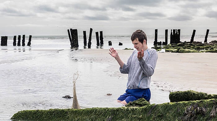 Liam O'Leary from Macroom having fun in a rockpool on one of the first dry and warm days during April at Harbour View. (Photo: David Creedon)