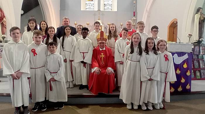 Pupils of Carrigboy National School who were confirmed at the ceremony in Kilcrohane Church last Thursday included (back, from left): Holly McCarthy, Rachel O'Donovan (secretary), Aimee Fehily, Michael Cronin (principal), Emily O'Donovan, Róisín Daly, Cyril Dlamini, Rachel Kelleher, Bishop Noel O'Regan, Sophia Russell, Dylan O'Sullivan Harrington, Canon Martin O'Driscoll, Owen Coughlan and Aaron O'Sullivan Harrington.  Front (from left): Aidan O'Mahony, Jack Levis, Daniel O'Sullivan, Emma Barry O'Callaghan, Aoife Bignell and Zara Mallon.