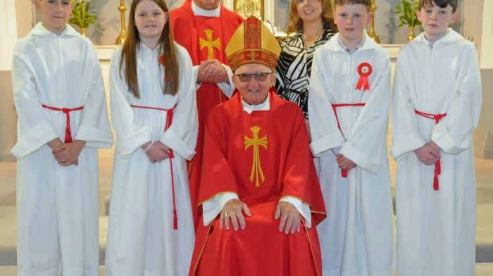 Pupils from Rusnacahara National School in Ahakista recently received their Confirmation in Our Lady Star of the Sea Church, Kilcrohane.  From left: Leo Arundel, Issy Ross, James Tobin and Keenan Young with Bishop Noel O'Regan, Canon Martin O'Driscoll and school principal, Noreen Tobin.