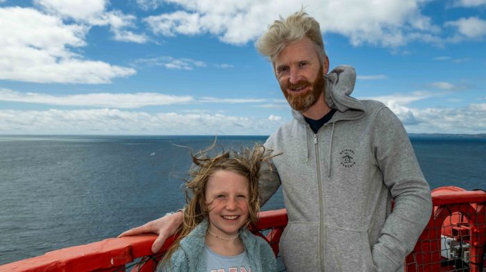 Rowan and Brian McCarthy from Rathbarry enjoying the views from the top of the Galley Head Lighthouse at the open day fundraiser that was held by Galley Flash Rowing Club.   Lighthouse keeper Gerald Butler gave a number of illustrated talks on the day.   (Photo: Andy Gibson)