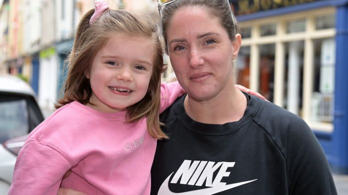 Locals Estee (left) and Emma Howlin posed for the camera in Pearse Street, Clonakilty.  (Photo: Martin Walsh)