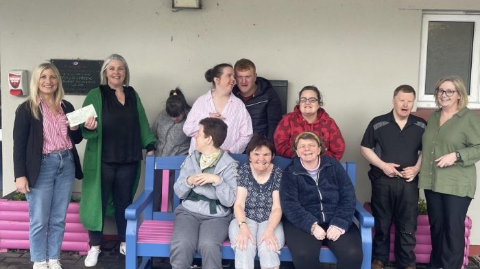 Mary Lou Maguire Leahy and Gillian Kennedy (coordinator Skibbereen day services CoAction), with a group of people they support. Mary Lou presented a cheque of €1,500 to CoAction from the Aughadown Community Council which was the proceeds from their annual St Patrick’s charity walk.