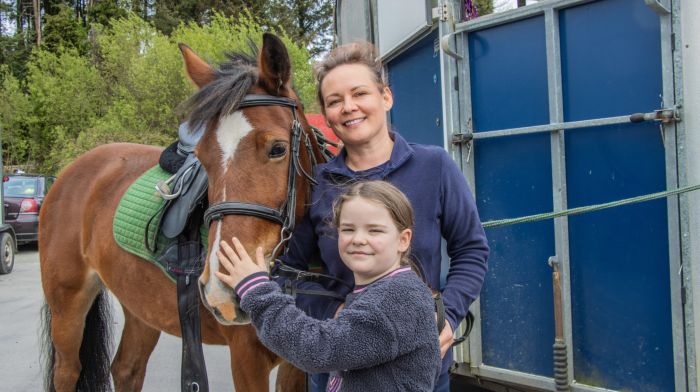 Supporting the fundraiser for their local playschool  at the Drinagh Cheval last weekend were Laura Scully, her daughter Madeline and their horse Stella. Right: John Regan, Yvonne Hagan and their dogs, Socks and Rex, and their horse Socks, at the cheval . (Photos: Gearoid Holland)