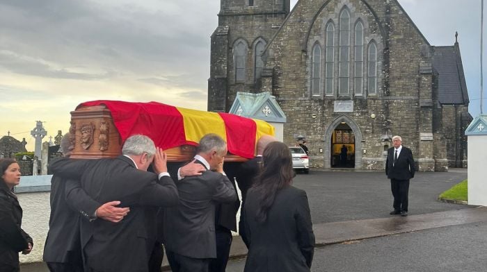 Family and friends carrying Cornie to the Church on Monday.