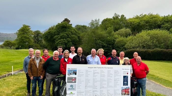 Adrigole GAA members along with the golf classic winners Eileen, Jimmy and David O'Sullivan at the presentation of prizes at Glengarriff Golf Club.