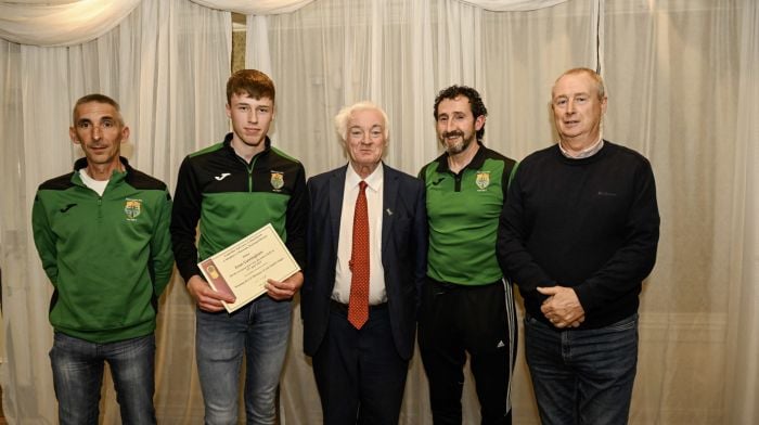 Cllr Michael Creed with Evan Cunningham and coaches from Macroom FC who won the U17 Division 3 soccer league at the civic reception ceremony hosted by Cllr Ted Lucey.   (Photo: Brian Lougheed)