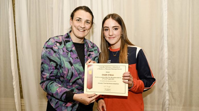 Cathaoirleach of Cork County Council’s Macroom Municipal District, Cllr Ted Lucey, hosted a civic reception recently to honour the awards won by various teams and individuals at underage (ages 12 to 18) throughout Macroom Municipal District. Cllr Lucey presented over 750 certificates to representatives of winning teams and individuals also acknowledging the great work being done by local volunteers to support young people in their achievements. Cllr Gobnait Moynihan with Orlaith O'Brien representing St Mary’s Secondary School who were the winners of A County, first year post primary competition.   (Photo: Brian Lougheed)