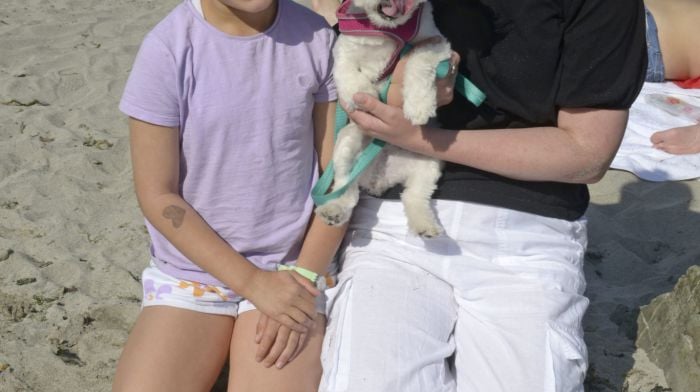 Sinead Chappen and her daughter Kayla from Bandon with Poppy the dog on a visit to Dock beach in Kinsale. (Photo: Denis Boyle)