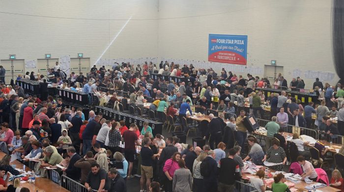 A bird's eye view of floor of Mallow GAA Complex showing the tallyfolk lined along the barriers, with a cross-party system of talling in operation for the first time ever, resulting in incredibly accurate data for election nerds.  (Photo: Martin Walsh)