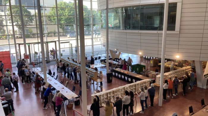 The view from the balcony of the count at County Hall last Saturday where the votes for Carrigaline were counted, which saw Seamus McGrath, below left, top the poll comfortably and Eoin Dalton O'Sullivan, below right, (seen with newly-elected Macroom Cllr Martin Coughlan) come in second.