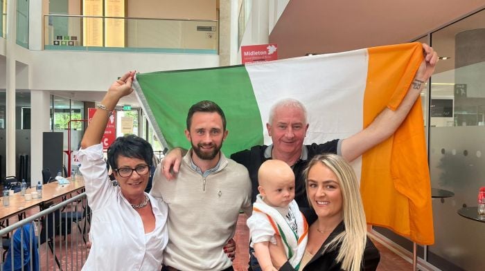 Sinn Féin's newest councillor, Eoghan Fahy, second from left,. celebrating taking the sixth seat in Carrigaline at County Hall with, from left: Audrey Fahy, John Fahy, Rían Fahy and Melanie McCarthy.