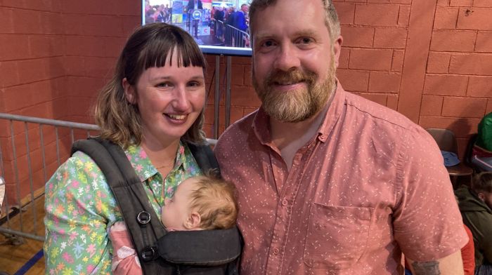 Outgoing Cllr Chris Heinhold with wife Emer and baby Maisie at the count in Clonakilty. Right: Fionn O’Driscoll-Hayes from Schull giving his approval for the count at Clonakilty.  (Fionn photo: Martin Walsh)