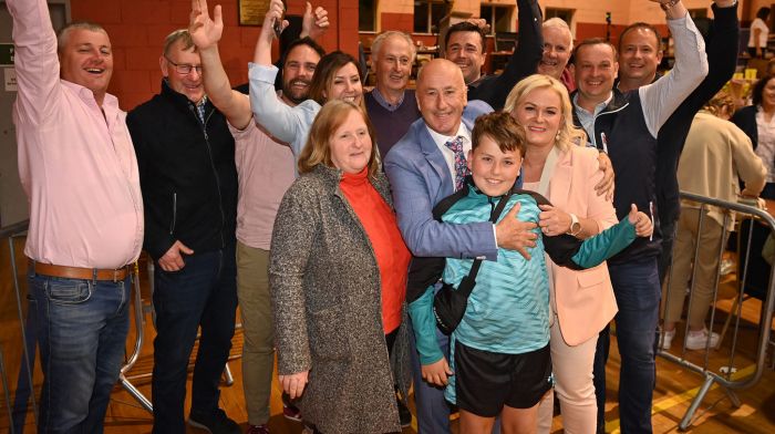 Poll-topper Alan Coleman (Independent) hugs his wife Yvonne and their son Darragh with their suporters following his election to the Bandon/Kinsale area. Photo: Martin Walsh.