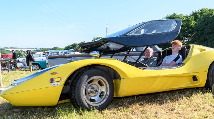 Jim and Tiernan Kelly (Enniscorthy, Co. Wexford) with their Nova kit car, one of only 300 made at the 27th Annual Innishannon Steam & Vintage Rally in aid of the Irish Cancer Society which has raised €1.5 million since 1997.
Picture: David Patterson, Tractor Run – Cork