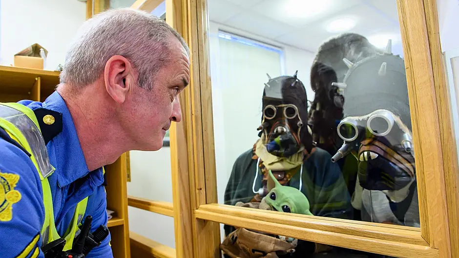 Garda Sgt. Chris Brosnan dealing with passport queries at the Dunmanway Feel the Force Star Wars festival over the June Bank Holiday Weekend.
Picture. John Allen