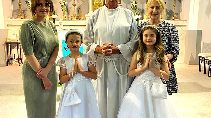 Pupils of Rusnacahara National School in Ahakista, Maggie O'Brien and Ciara Daly, received their First Holy Communion in Church of Mary, Star of the Sea, Kilcrohane recently with celebrant Fr John C O'Donovan and school staff Lauren Wall and Maureen Arundel.
