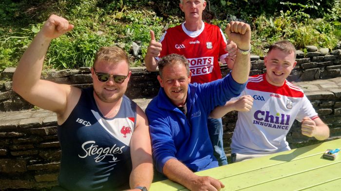 Aaron, Diarmuid and Tom Cagodan with John Leonard celebrating Cork's victory at the final whistle at sun-soaked Cape Clear. There was great banter as a Donegal Film Crew was also on the island listening to the game on the radio.  (Photo: Garry Minihane)