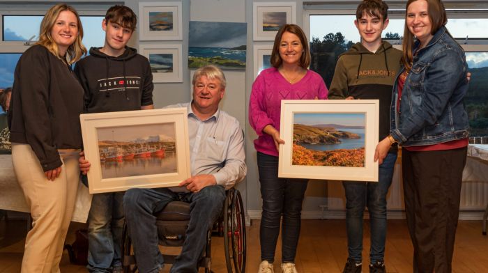 Photographs of Castletownbere were presented to Aubrey Jaap and Lindsay Mulcahy, director and assistant director of Butte Silver Bow Archives, by twins David and Eoin Dudley,  Cllr Patrick Gerard Murphy and Cllr Siobhan Cronin.  (Photo: Anne Marie Cronin)