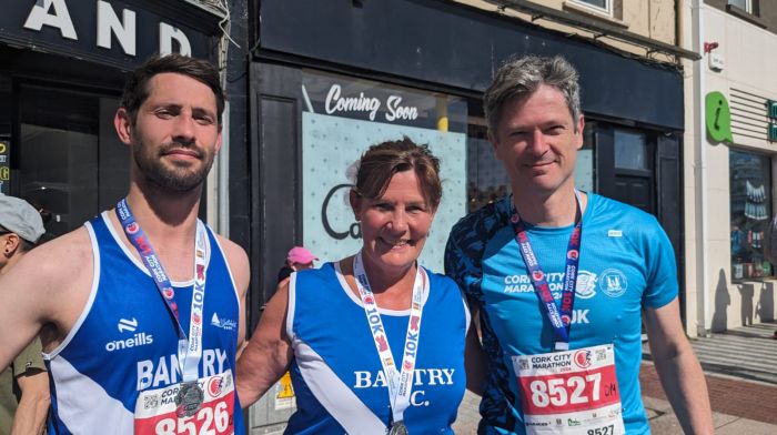 Brian Begley, Fiona Begley and Danny Manning from Bantry Athletic Club participating in the Cork City Marathon.