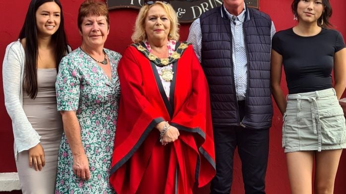 Mayor Eileen Sheppard welcomed John Callaghan home after his seven consecutive charity climbs of Carrauntoohil in seven days at an event held O’Donovan’s Hotel last Saturday evening, where he was also greeted by his wife and daughters (from left): Kate, Catherine and Orla.