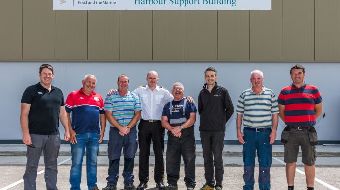 Seamus Mullins has been working in his local harbour of Castletownbere for several years and is wished all the very best on his retirement. From left: Joe McCarthy, Paul Nee, Brian O’Shea, Martin Mylotte,  Seamus Mullins, Gerome McCarthy, Tony Harrington and Alan Sullivan. (Photo: Anne Marie Cronin)