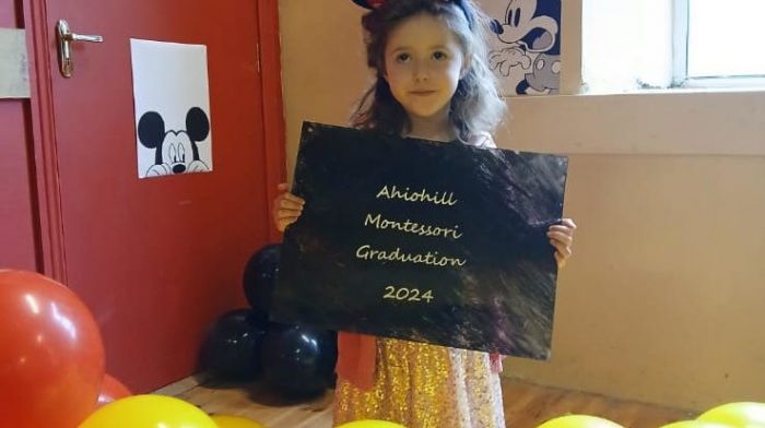 Thea Buttimer from Ahiohill Montessori celebrating her Disney themed graduation day.