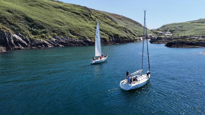 Two yachts just over the line at the end of the Three Square Mile race heading into an idyllic North Harbour at Cape Clear for prizegiving and a barbecue.