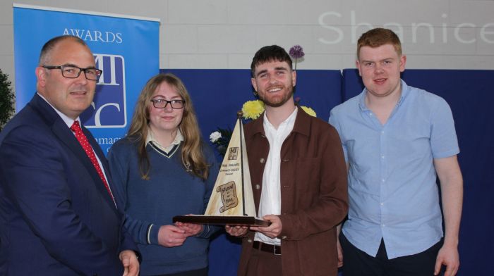 Niall Murphy (principal, MICC) with Shanice Kingston receiving her student of the year award from special guest and past pupil Bill Maybury, along with Evan Wilson, who was the student of the year in 2023.