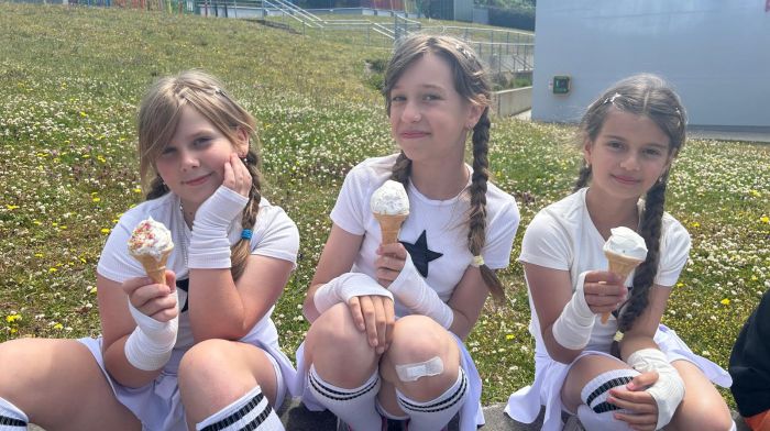 Anastasiia Shevchuk, Emiliia Kravchenko and Feride Seimetova enjoying a well-deserved ice cream break after the Rath National School talent show where they performed a Ukrainian cheerleading routine.