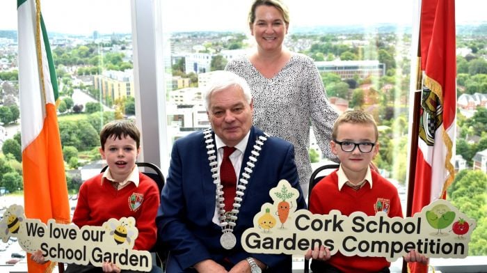County mayor Frank O'Flynn with pupils Seamus Nyhan and Tom Wilmot-Gernan and teacher Noelle McCarthy from Gael Scoil Dhroichead na Banndan at the County Hall for the presentation of awards at the Muintir na Tir/Cork County and City Councils Schools' Garden Competition.  (Photo: Mike English)