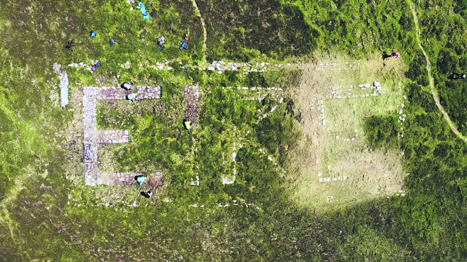 ‘Éire’ sign is unearthed on Dursey island Image