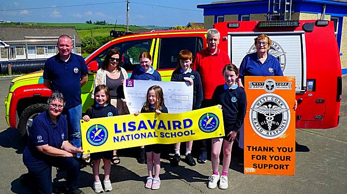 Lisavaird National Schools parents association recently presented a cheque of €1,550 from the Rosemary Calnan tractor, truck and vintage car run to West Cork Rapid Response members with the help of some of the pupils of Lisavaird NS.  Back (from left) Liam Slattery WCRR, Marian O’Keeffe, Anna Calnan, Matthew Calnan, Paul Calnan and Betty Hennessy WCRR. Front (from left) Kate Crowley WCRR, Isla O’Keeffe, Ella Mae White Slattery and Kimberley Rose White Slattery.