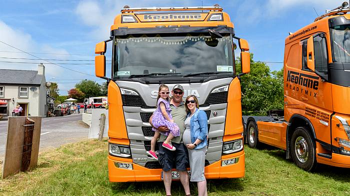 Ava, Patrick and Claire Dullea from Ballinascarthy took part driving a Scania R540 truck at the Lyre tractor, car, truck and motorcycle run which was held in aid of Cancer Connect and Knockskeagh National School’s Astroturf fundraiser.  (Photo: David Patterson)